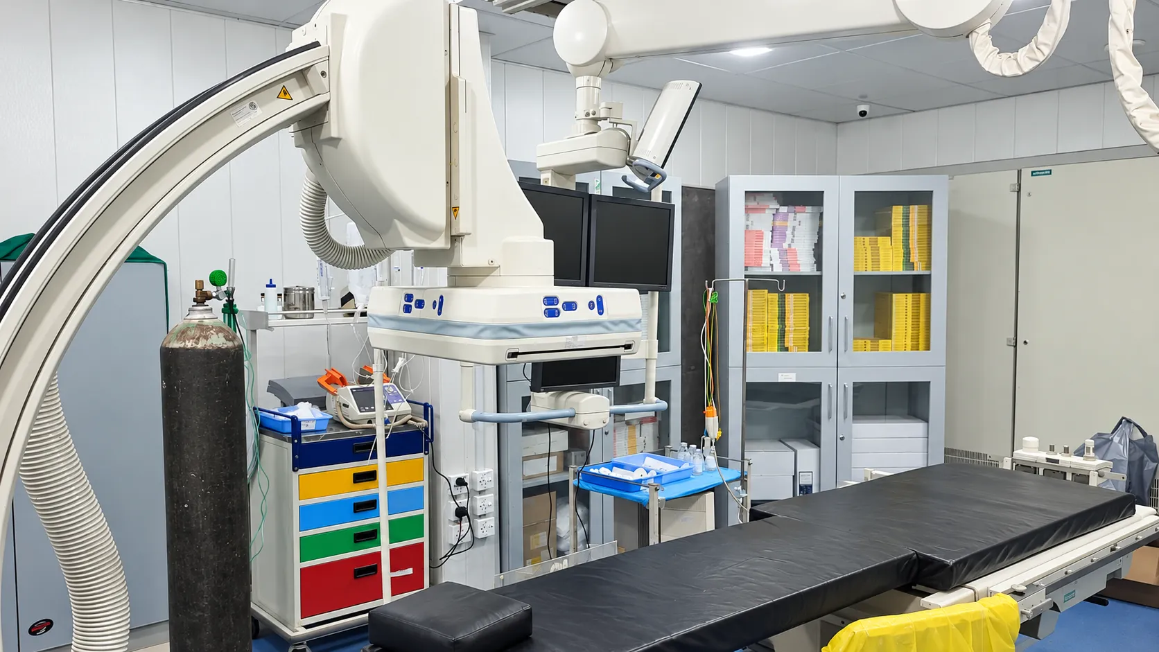 A second view of the Cath Lab imaging system and examination table
